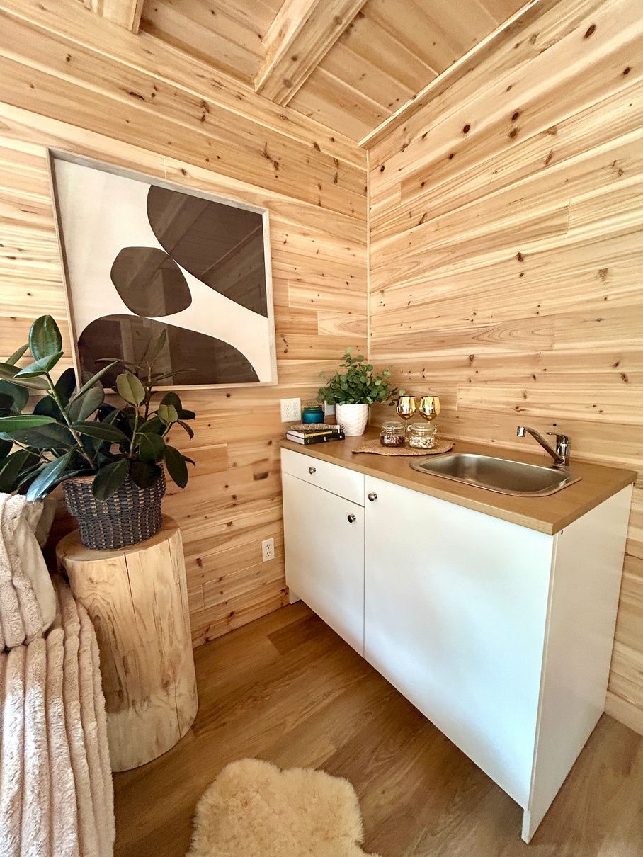 The Cedar Cabin kitchenette with sink and mini fridge