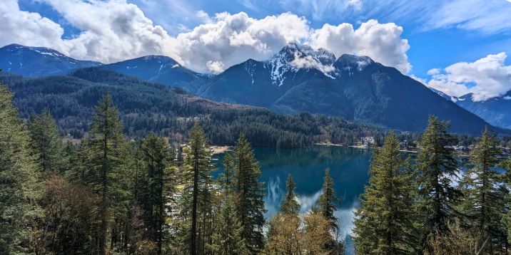 A mountain lake ringed by evergreens near Hope, BC