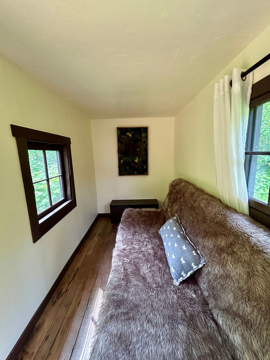 The futon bed inside the Othello Cabin